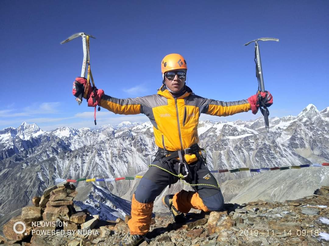 Kesang Namgya on summit tengkoma peak
